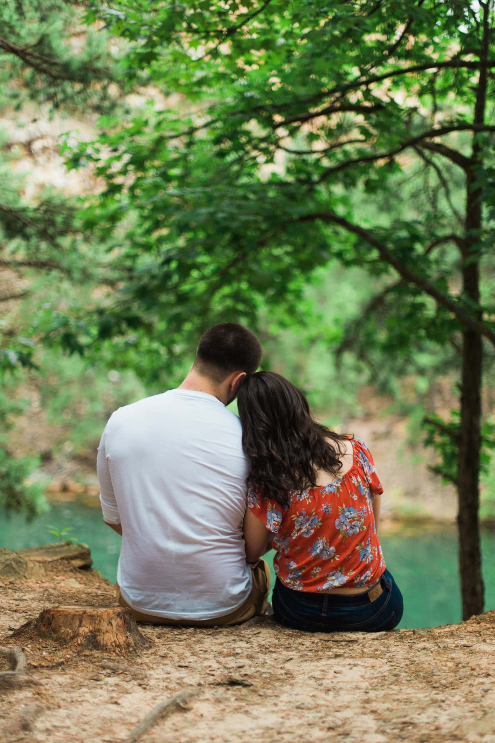 pinnacle-mountain-engagement-couple-looking-at-lake