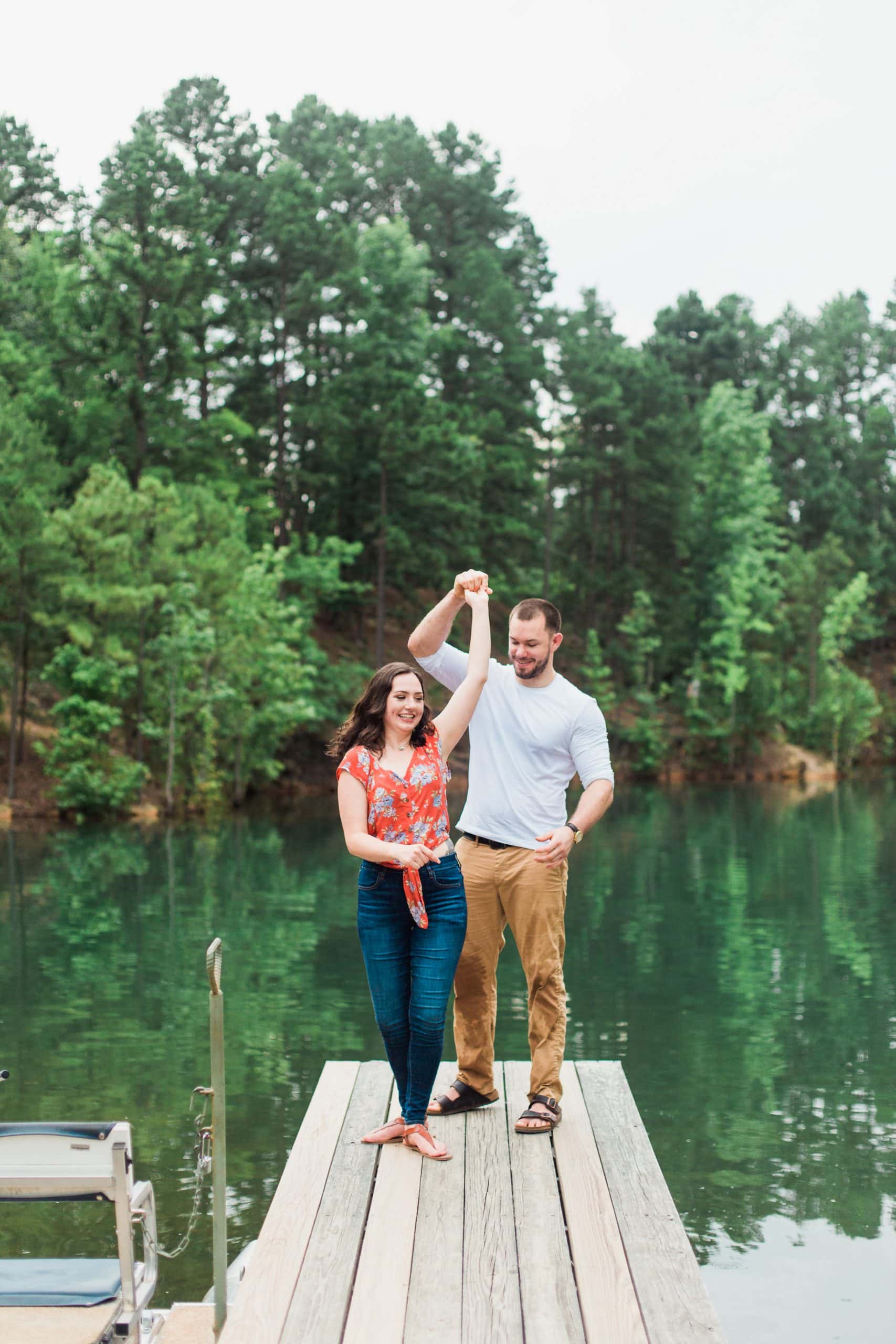 dancing-at-lake-for-pinnacle-mountain-engagement