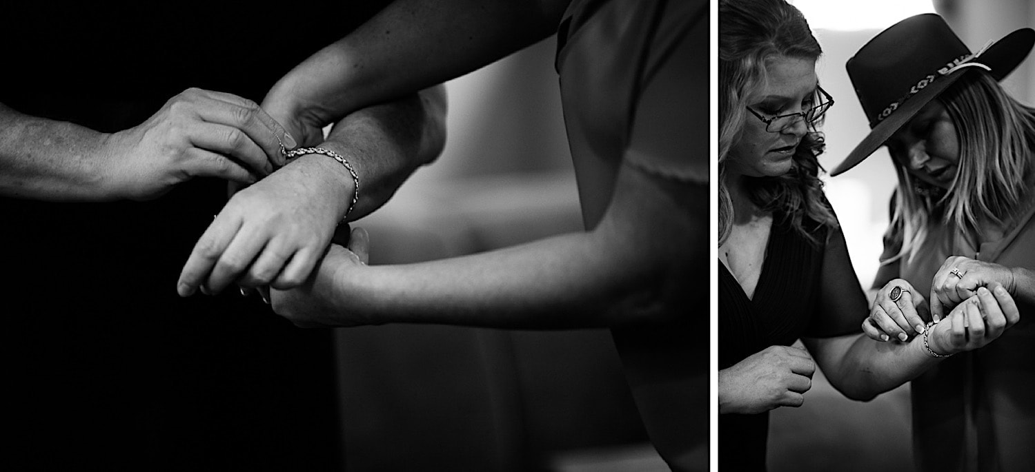 Maid of honor helping bride put on bracelet