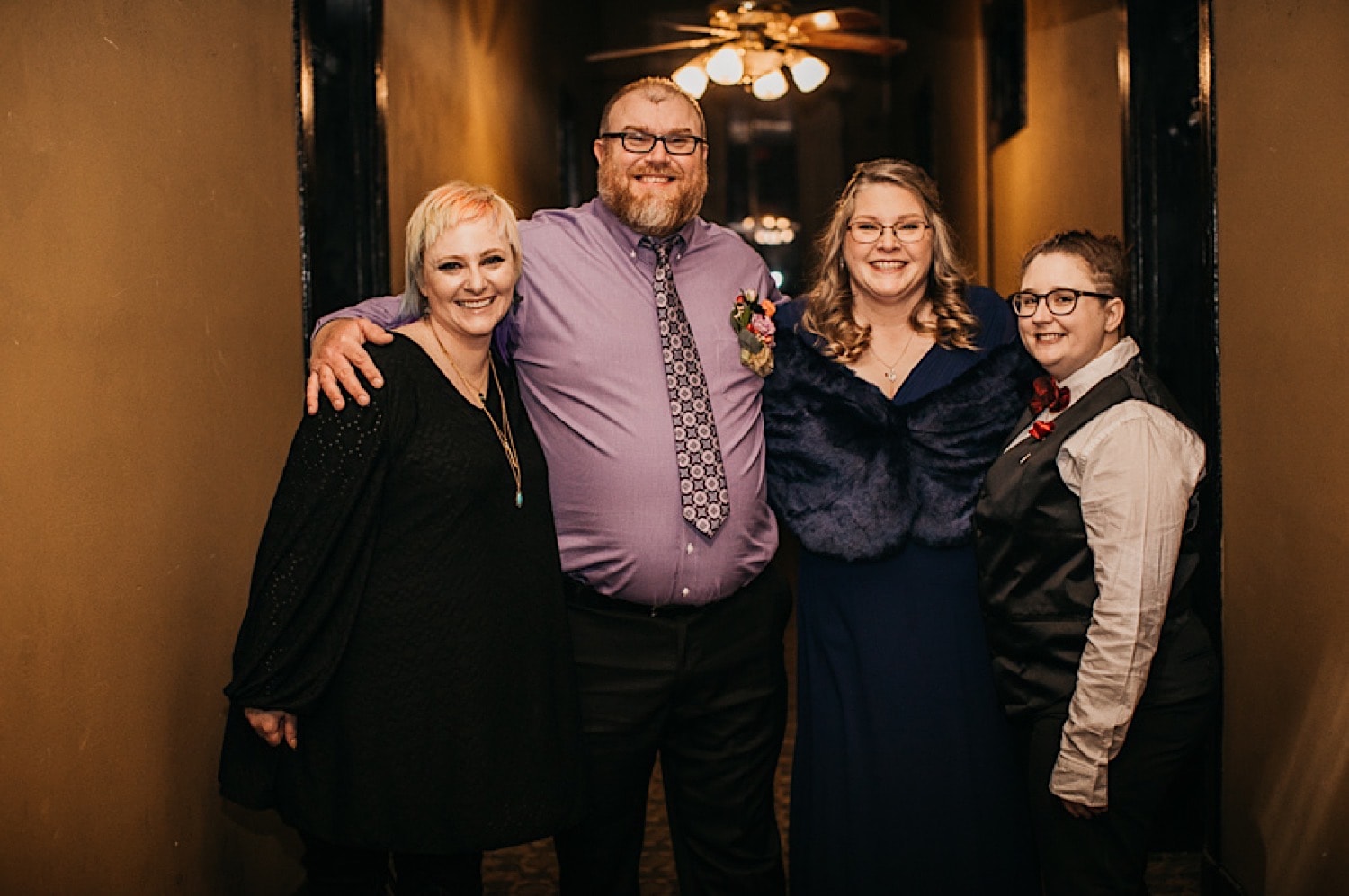 Bride and Groom taking photos with guests