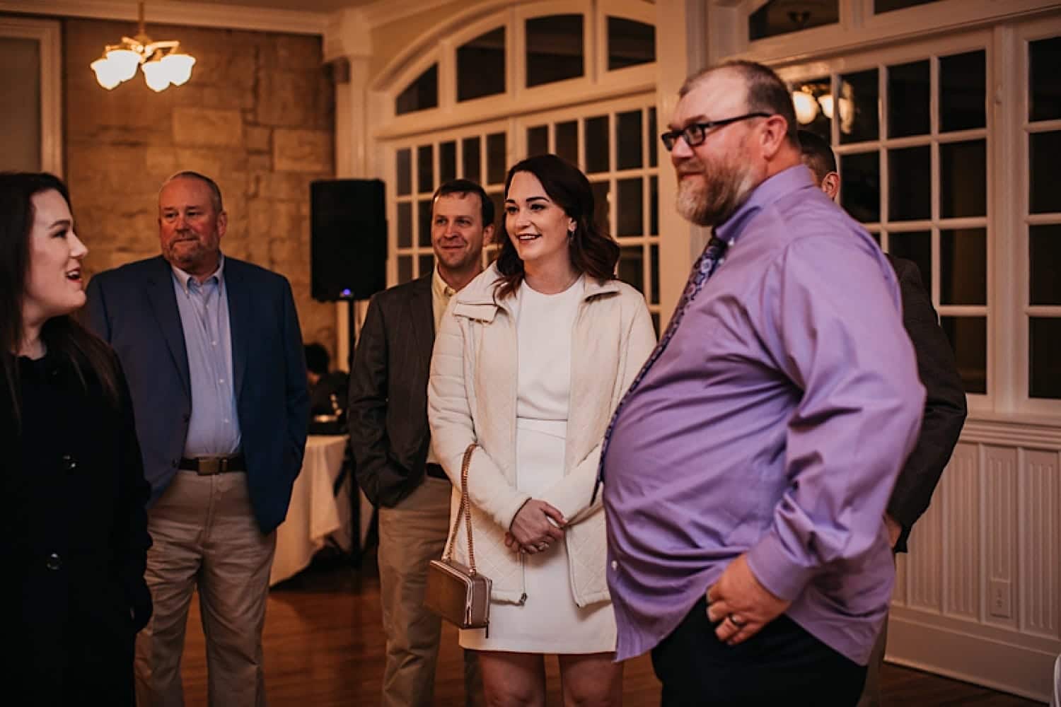 Groom mingling with guests