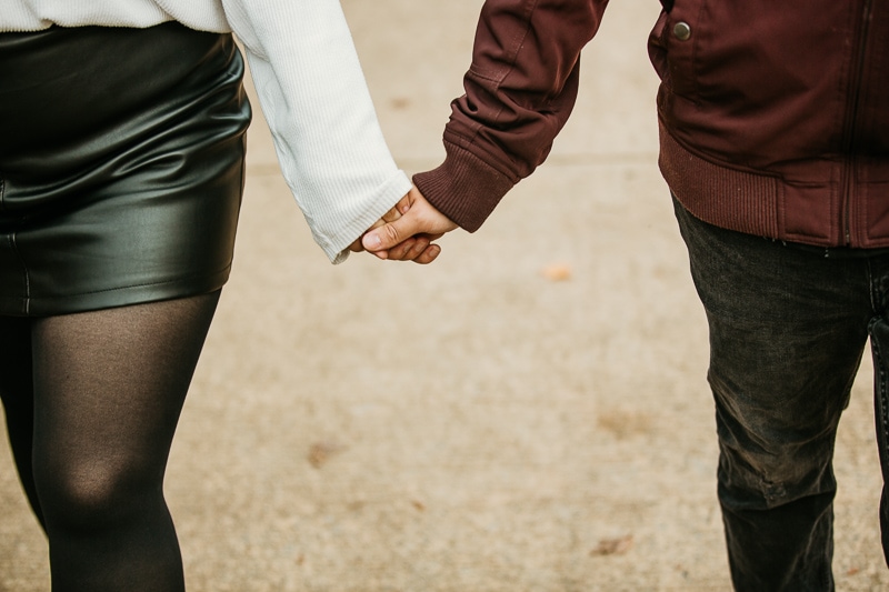 Holding hands at Big Dam Bridge walkway