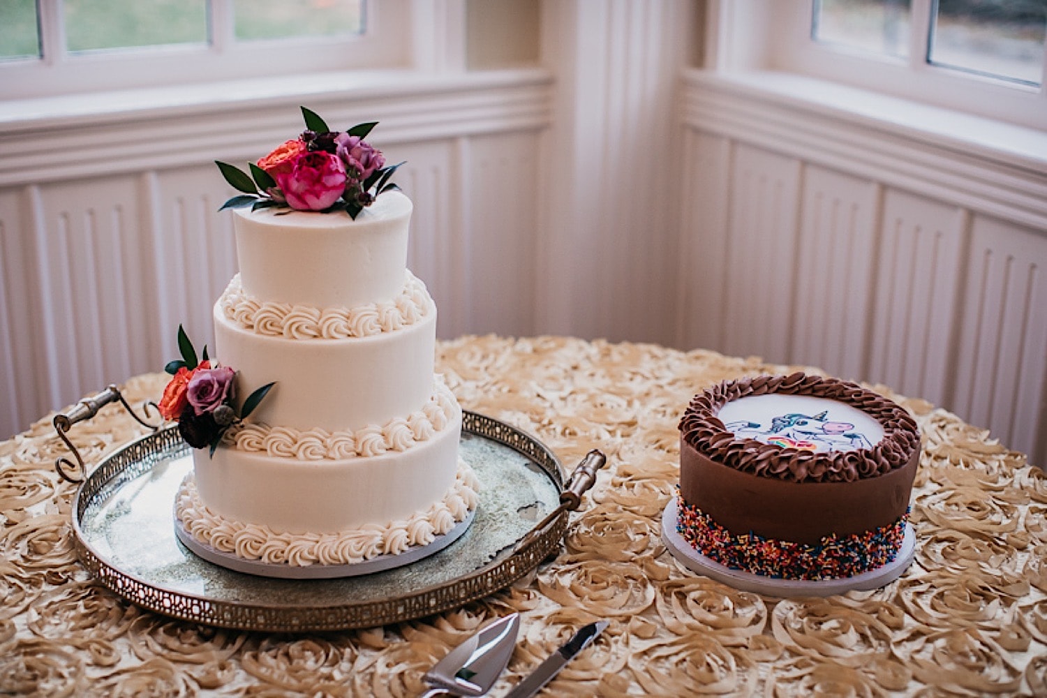 3 tier cake with flowers by Jordan Grisham
