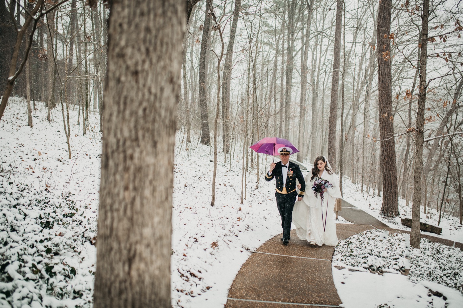 father-and-bride-walking-through-the-snow