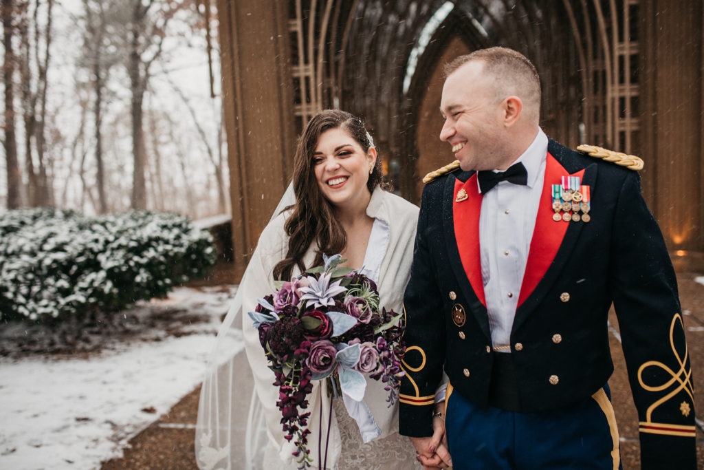 bride-and-groom-at-mildred-b-cooper-chapel-wedding-in-snow