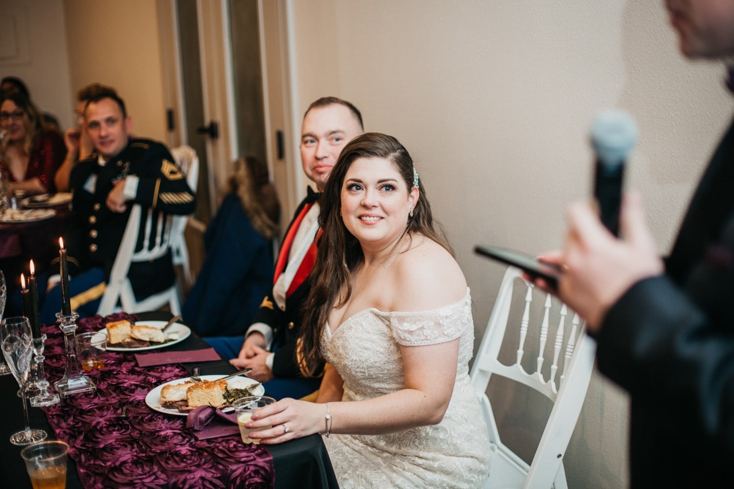 bride-and-groom-listening-to-toasts