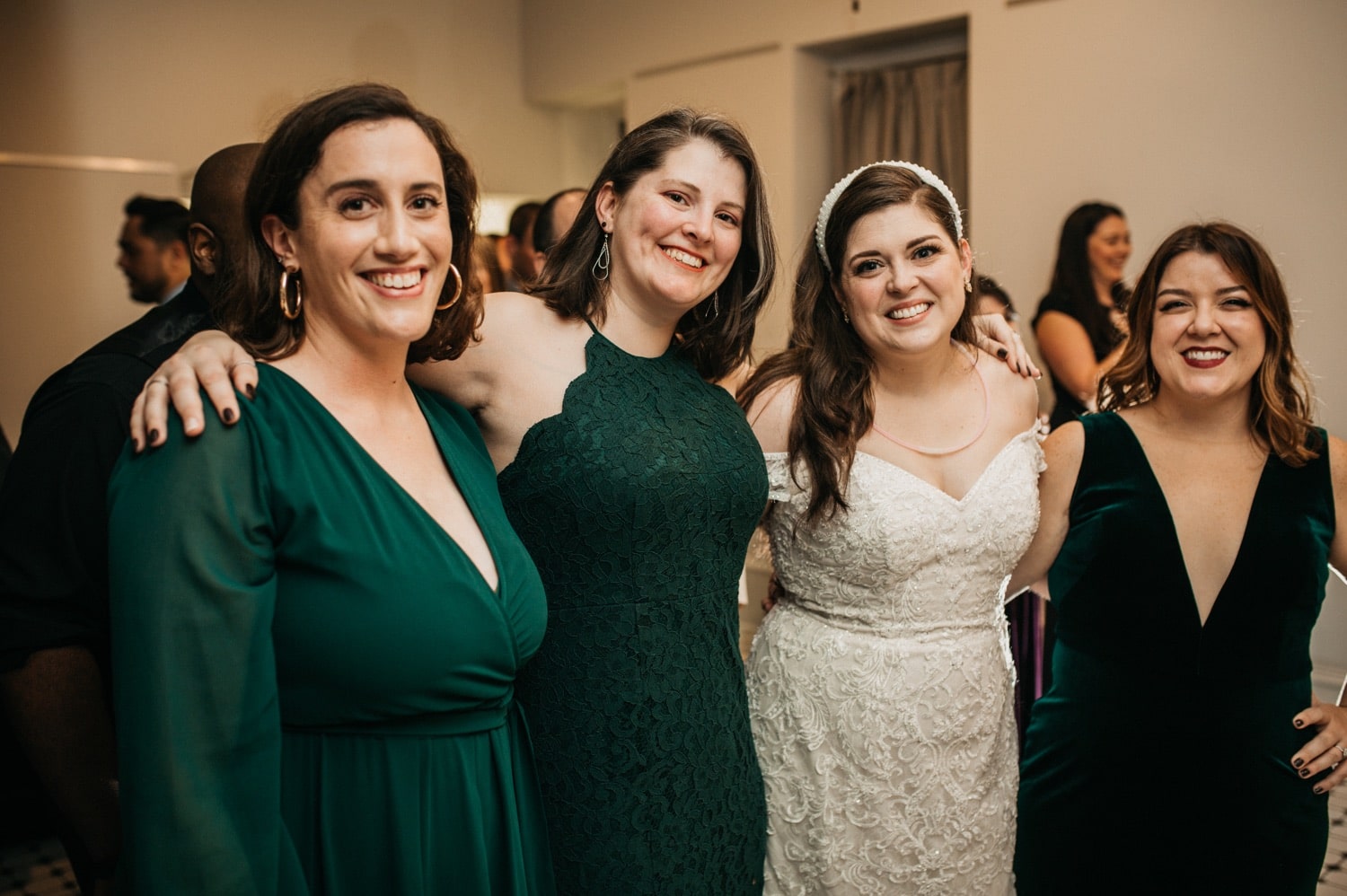 bride-standing-with-wedding-guests